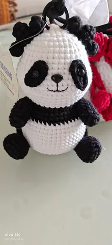 Panda with a bow