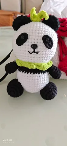 Panda with a green scarf